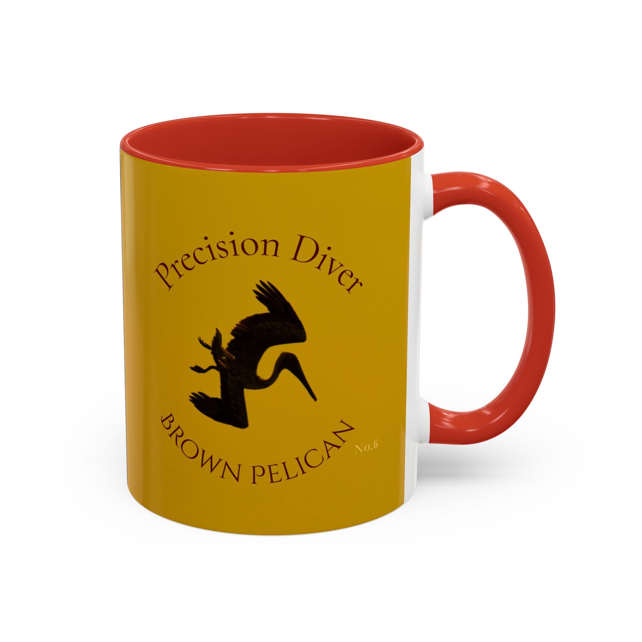 Yellow mug with red interior and handle featuring a black diving silhouette of a pelican and text.